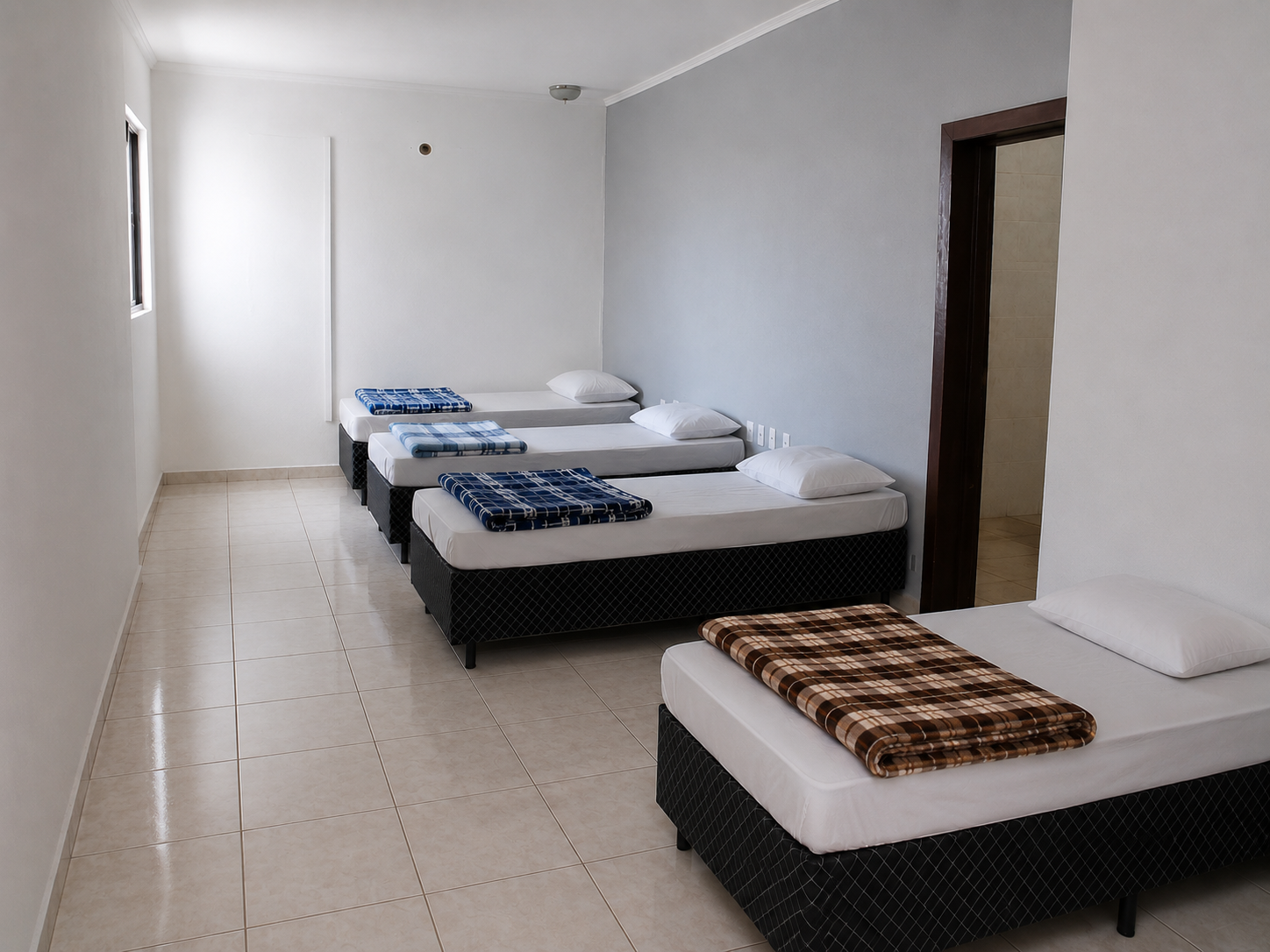 Quarto quáduplo econômico da Pousada do Trabalhador
